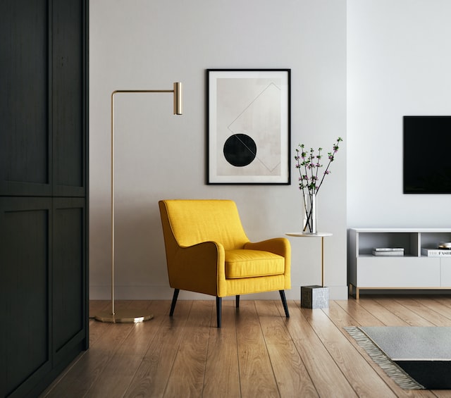 Yellow chair in a white and black room