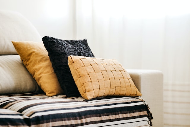 Throw pillows placed on a sofa.