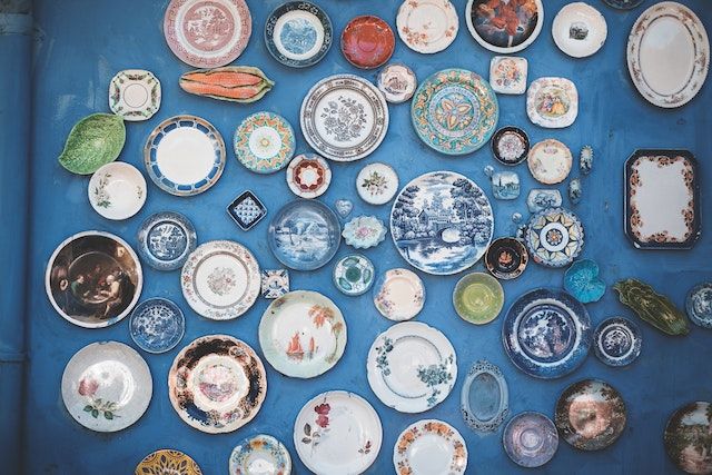 Collection of ceramics on a wall.