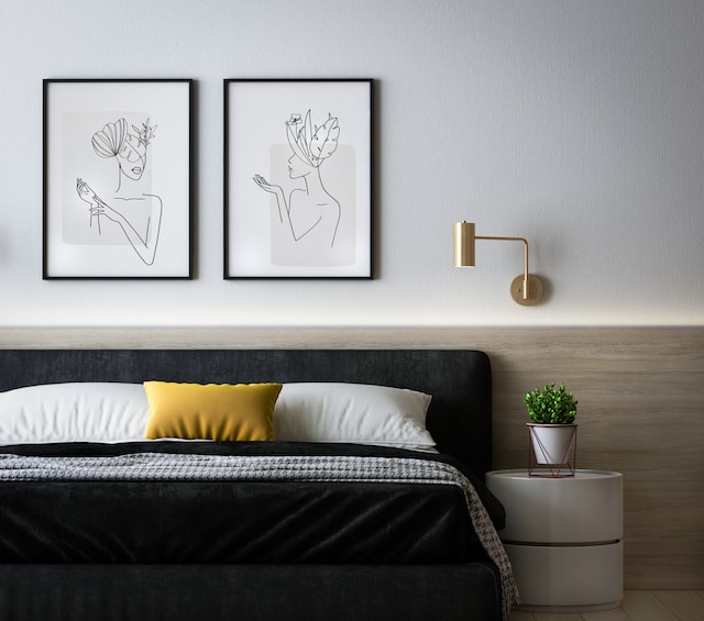 Local art and décor on a bedroom wall.