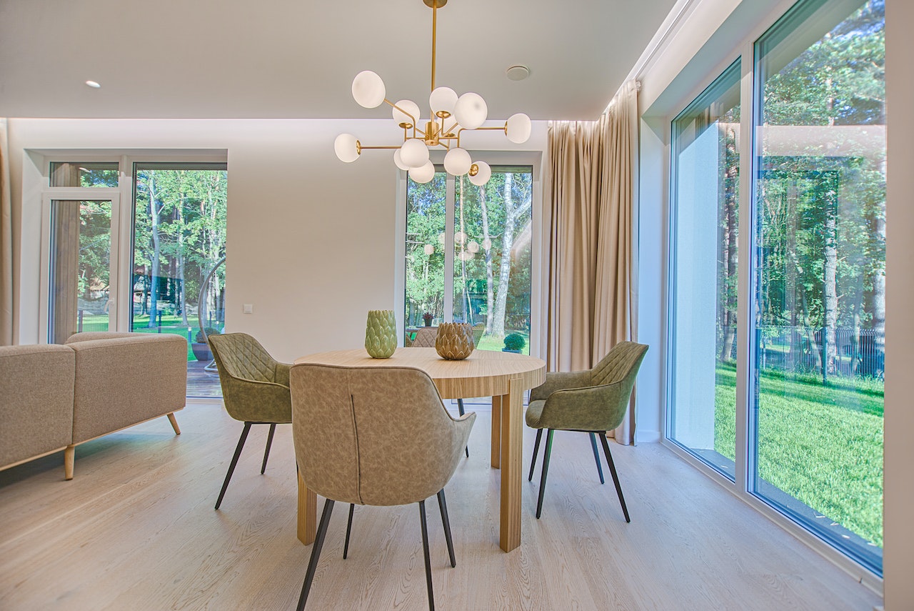 a dining room with a gorgeous chandelier